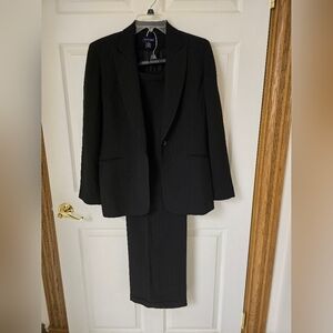 Ann Taylor Black Pinstripe Suit. Jacket Size 10, Pants Size 12. Like New!!!